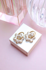 Jojo gold earrings: Flowers + Gold Oval Hoops