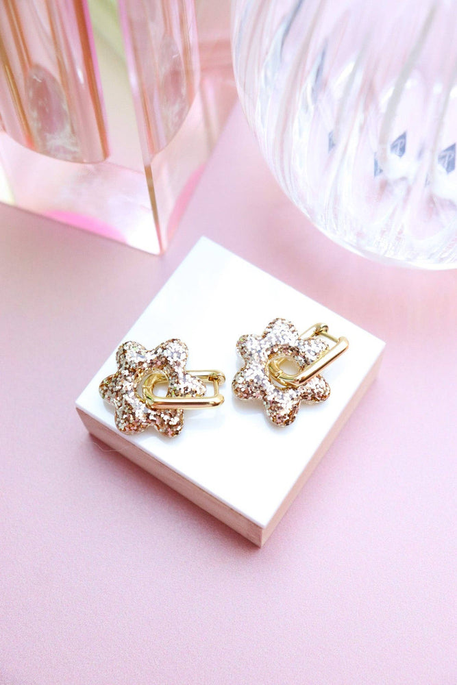 Jojo gold earrings: Flowers + Gold Oval Hoops